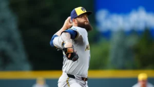 Dallas Keuchel attempts a remarkable MLB comeback, signing with the Kansas City Royals. Discover how the Astros legend’s journey could impact the AL Central race.