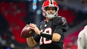 Kirk Cousins on Atlanta Falcons sideline during the 2025 NFL season, backup role