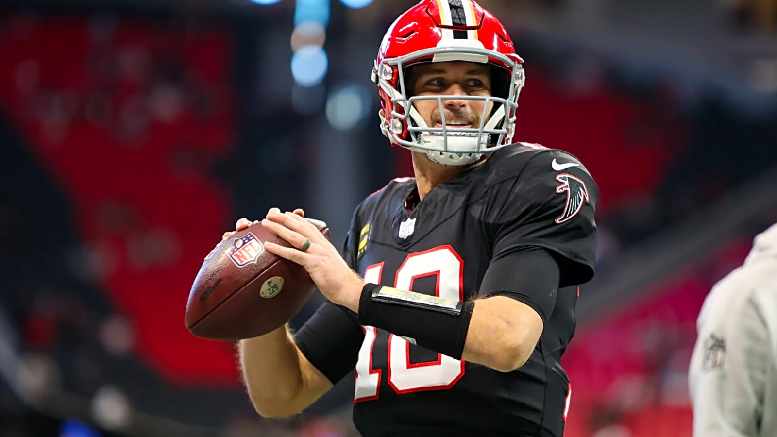 Kirk Cousins on Atlanta Falcons sideline during the 2025 NFL season, backup role